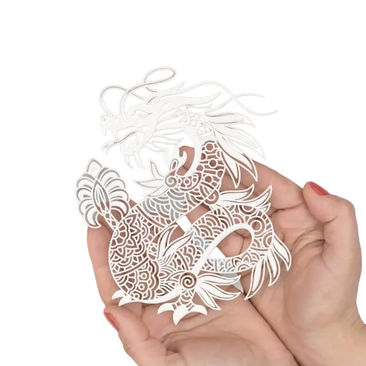 A delicate white metal cutting die featuring an intricate paper-cut dragon with lace-like patterns for Chinese New Year