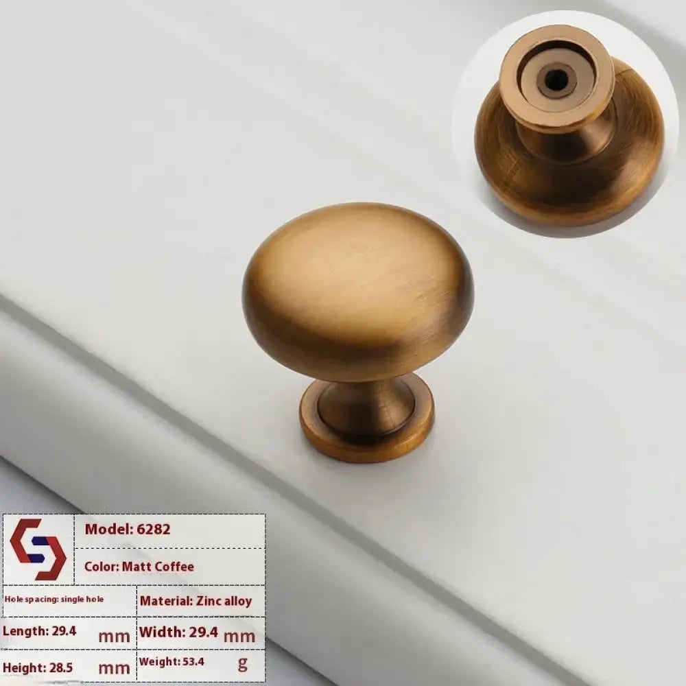 Matte coffee-finished zinc alloy cabinet knob with rounded domed head and cylindrical base in minimalist brushed brass set