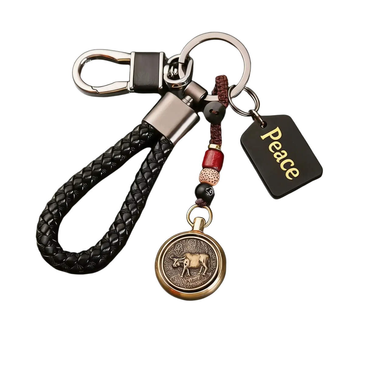 Chinese zodiac braided leather keychain with black braids, bronze cow medallion, red black beads, and peace tag