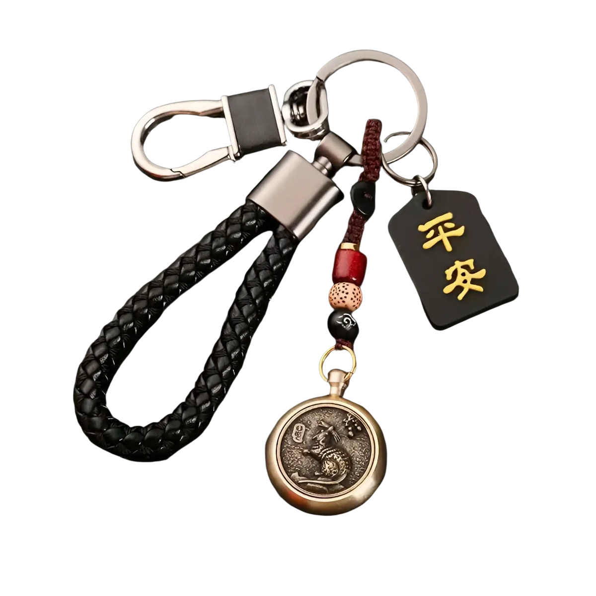 Black braided leather keychain with bronze dragon pendant, red and black beads, and gold Chinese characters tag