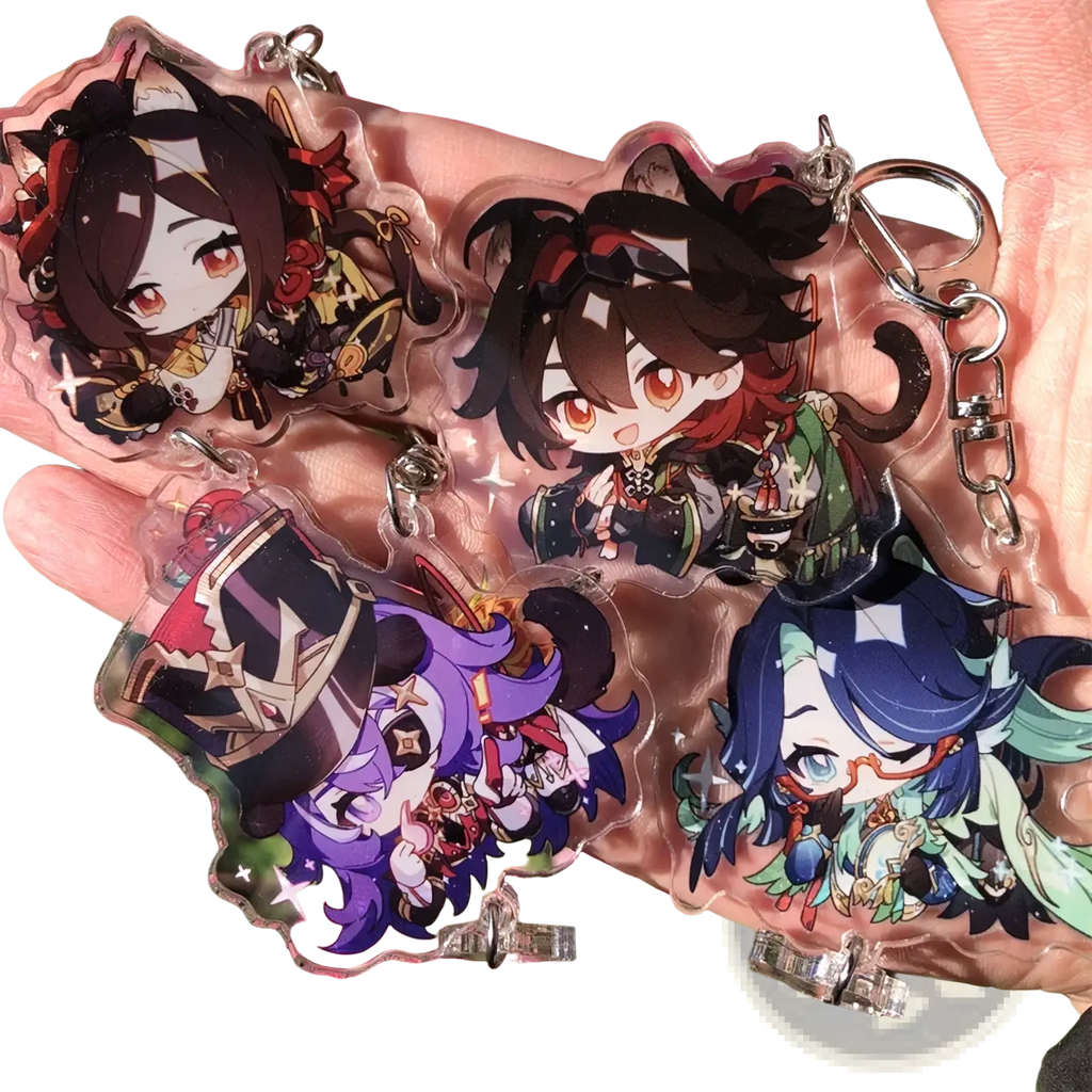Clear acrylic chiori keychains featuring chibi anime characters with vibrant hair and silver metal rings for gaming collection