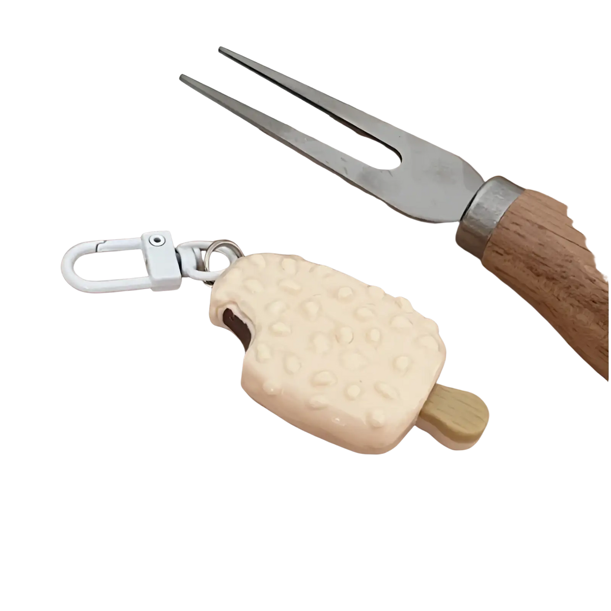 Cream-colored textured ice cream pop keychain with wooden stick and silver metal clasp for chocolate biscuit bag pendant