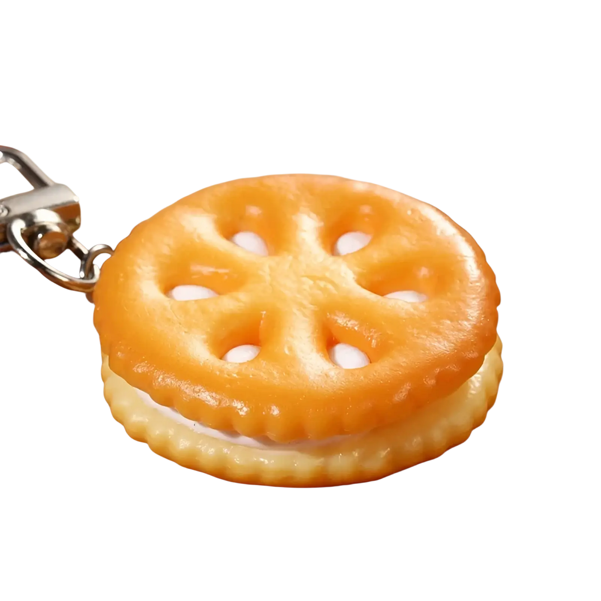 Orange and white chocolate biscuit cartoon key chain bag pendant with a silver metal clasp and cookie shape