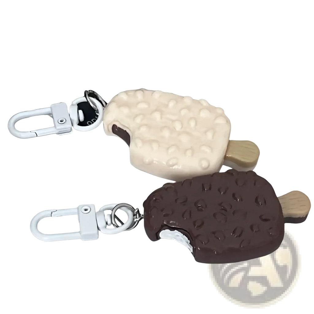Two chocolate biscuit cartoon key chain bag pendants in beige and dark chocolate colors with wooden stick handles