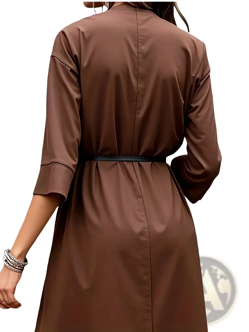 A chocolate brown satin midi shirtdress with three quarter sleeves and a black belt at the waist