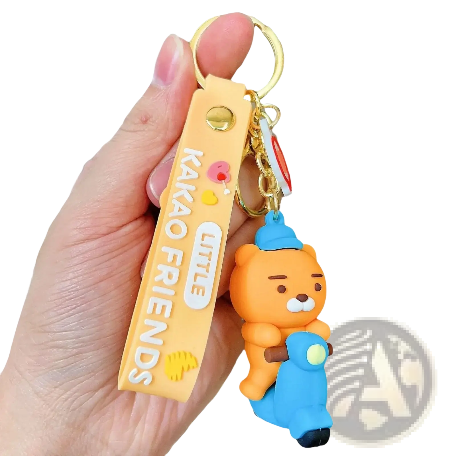 Orange silicone bear figurine keychain with blue scooter and yellow strap featuring little friends branding vintage style
