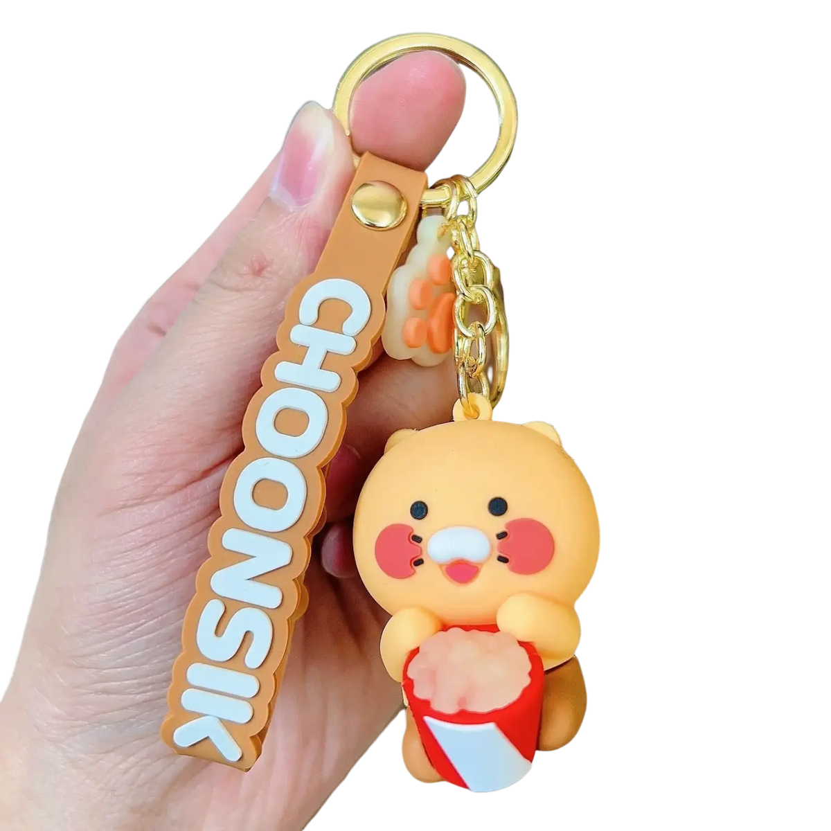 Orange choonsik silicone scooter keychain featuring a cute chubby cartoon character holding popcorn with red cheeks
