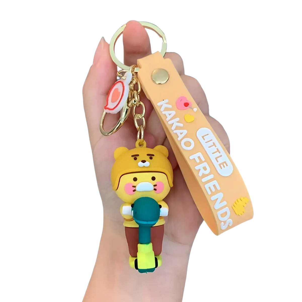Yellow silicone choonsik scooter keychain featuring a cartoon bear with microphone attached to orange kakao little friends strap