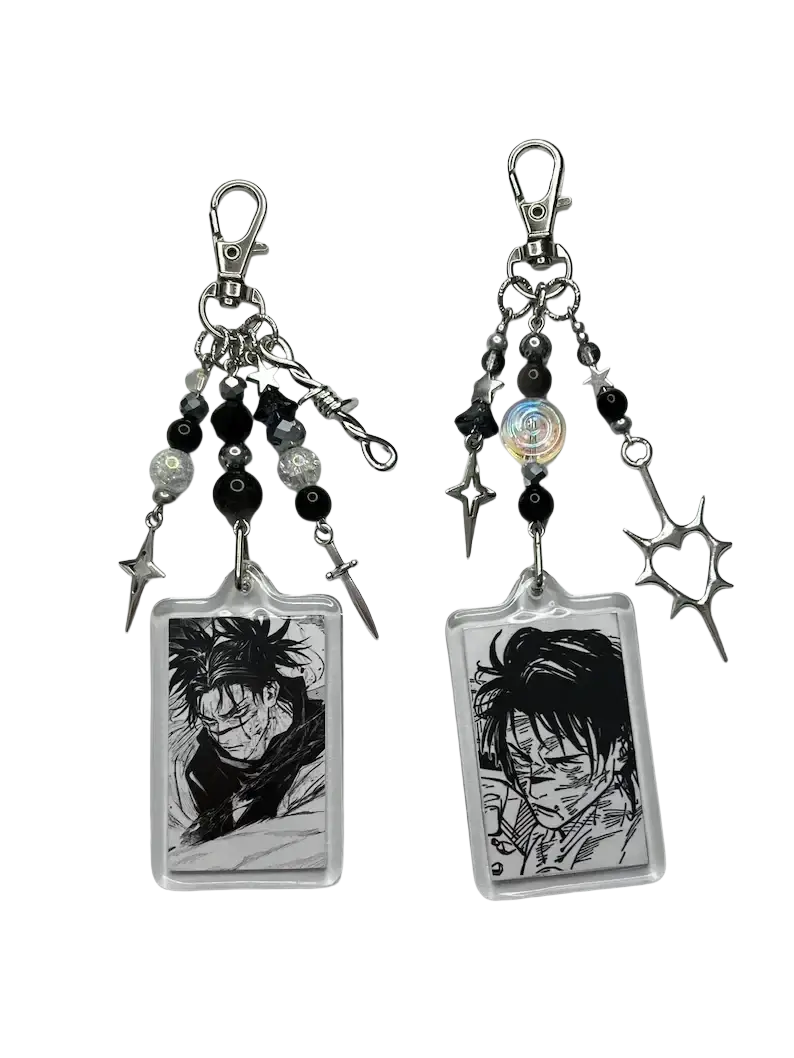 Two black and white choso y2k anime beaded acrylic keychains with clear frames silver metal charms and beads