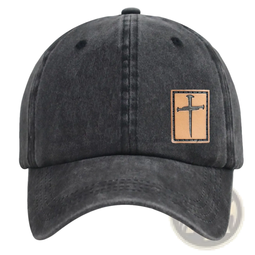 Dark gray distressed denim baseball hat with tan leather patch embroidered with a Christian cross design