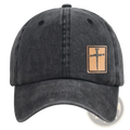 Dark gray distressed denim baseball hat with tan leather patch embroidered with a Christian cross design