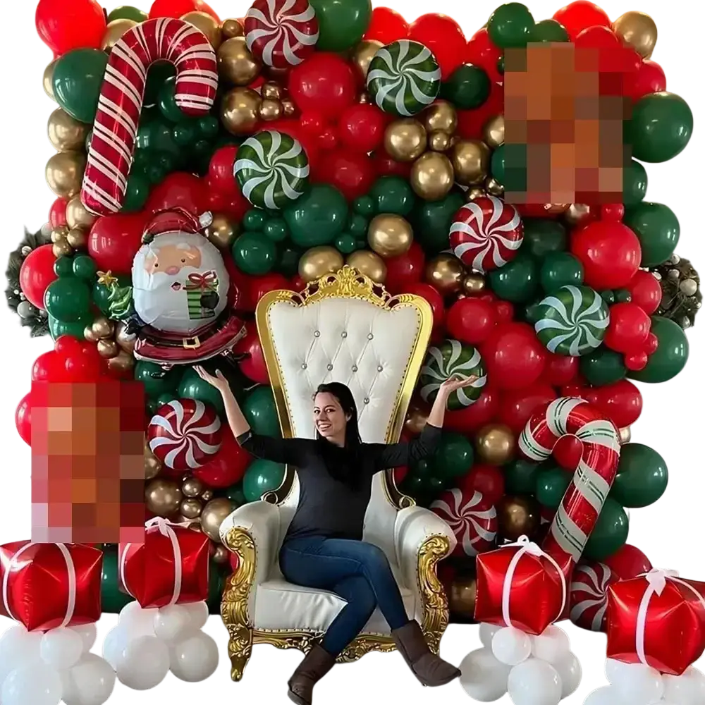 White tufted throne chair with gold ornate detailing beside red green gold candy cane balloon arch kit for christmas decor