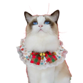Christmas dog collar with red and green plaid bow, white lace trim, and small gold bells for festive wear