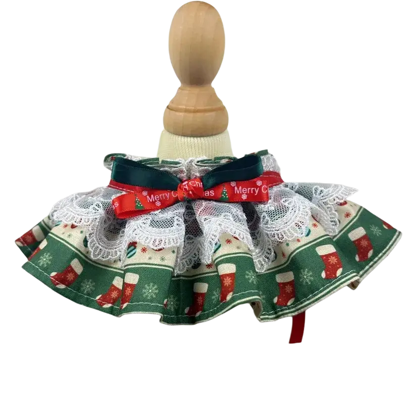 Christmas dog collar with green fabric red stockings snowflakes white lace ruffles and festive red merry christmas bow