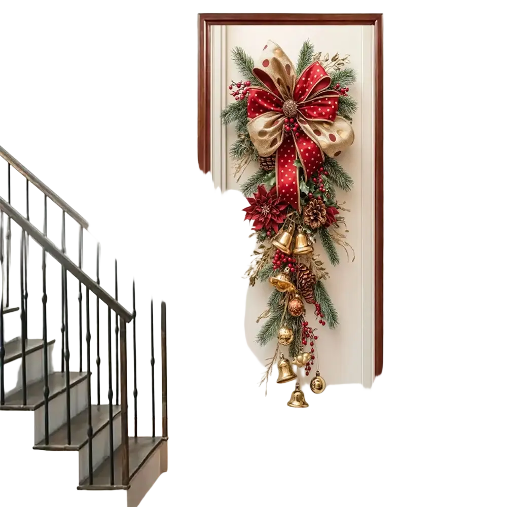 Christmas door wreath with bells and red bow featuring festive red and gold garland with pine branches and berries