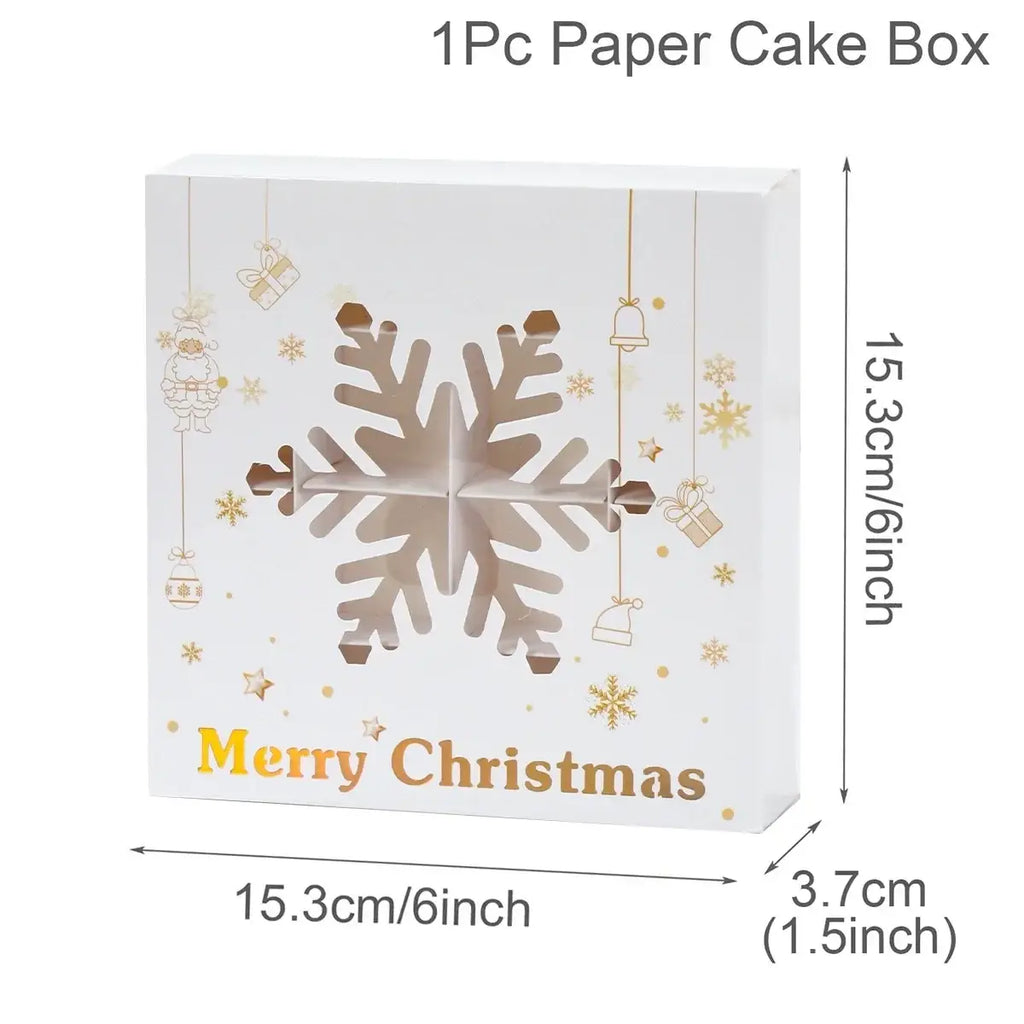 White paper gift box with gold snowflake cutout and festive merry christmas lettering for holiday cookie packaging
