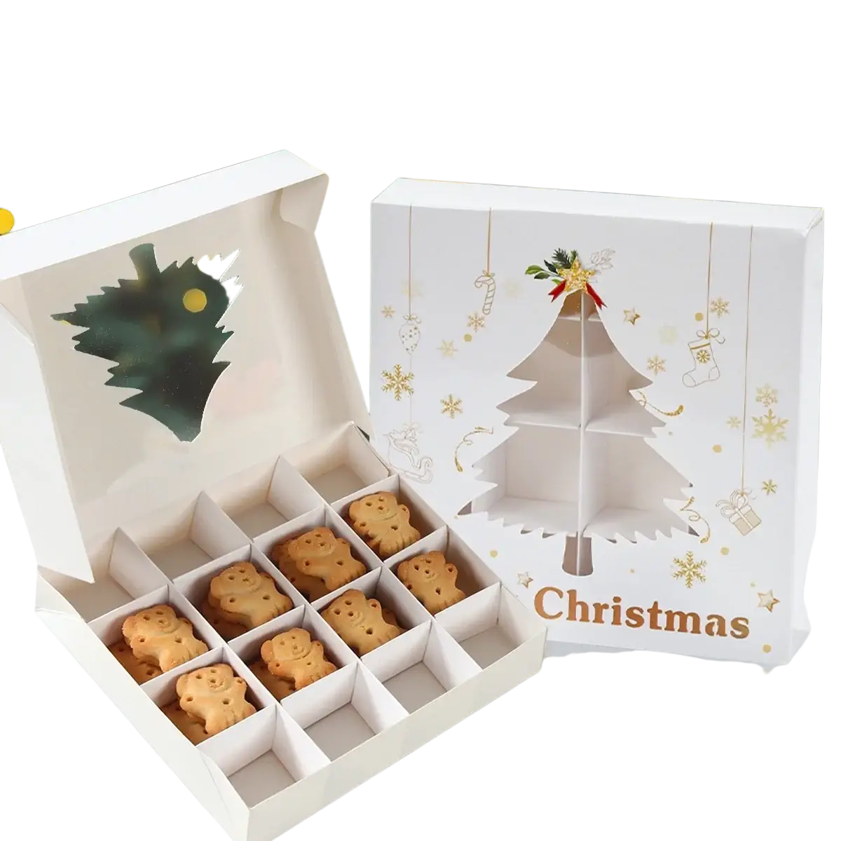 White christmas-themed gift box with gold foil paper-cut tree design containing golden-brown snowman cookies