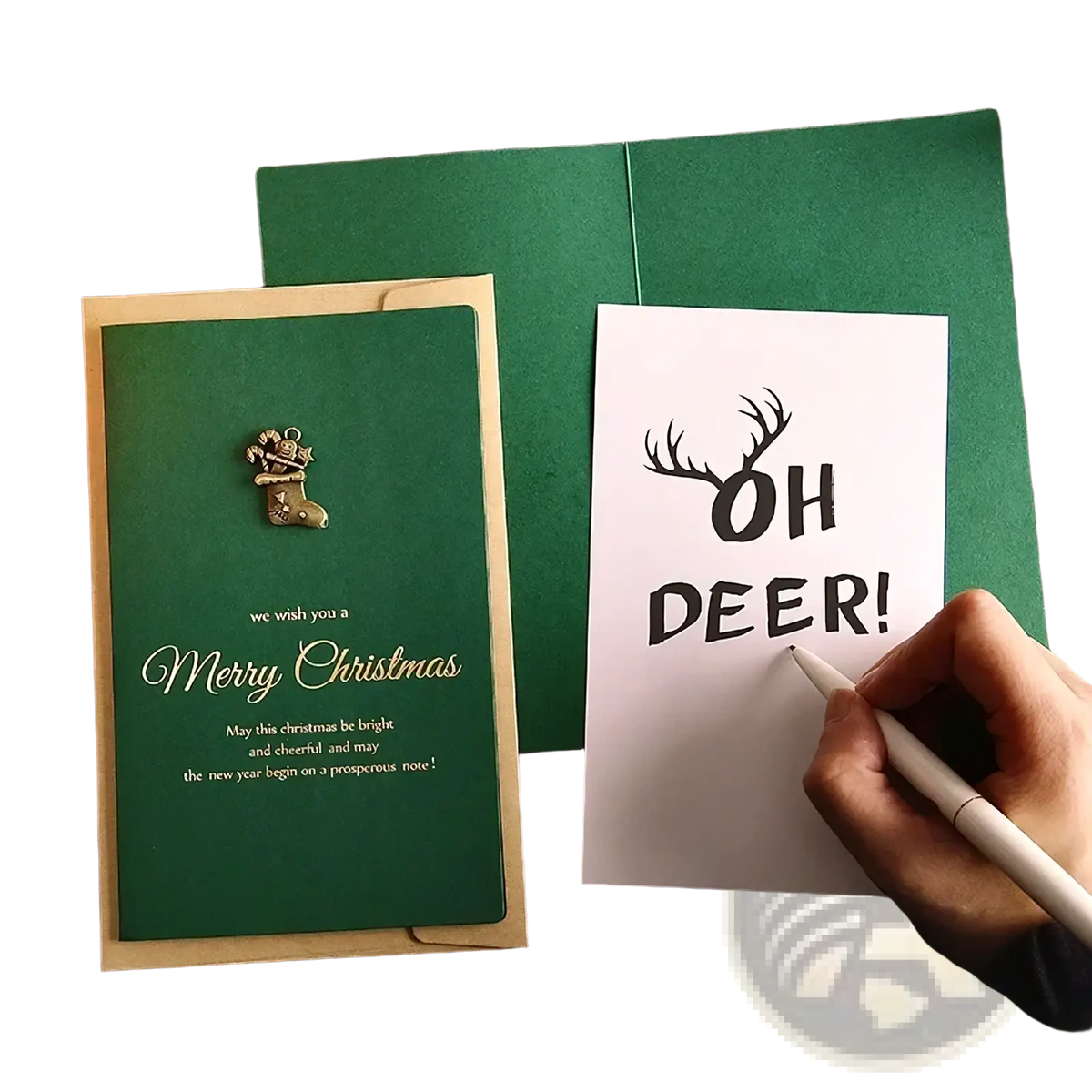 A small metallic christmas stocking pin with festive design included in christmas greeting cards set with gold foil envelopes