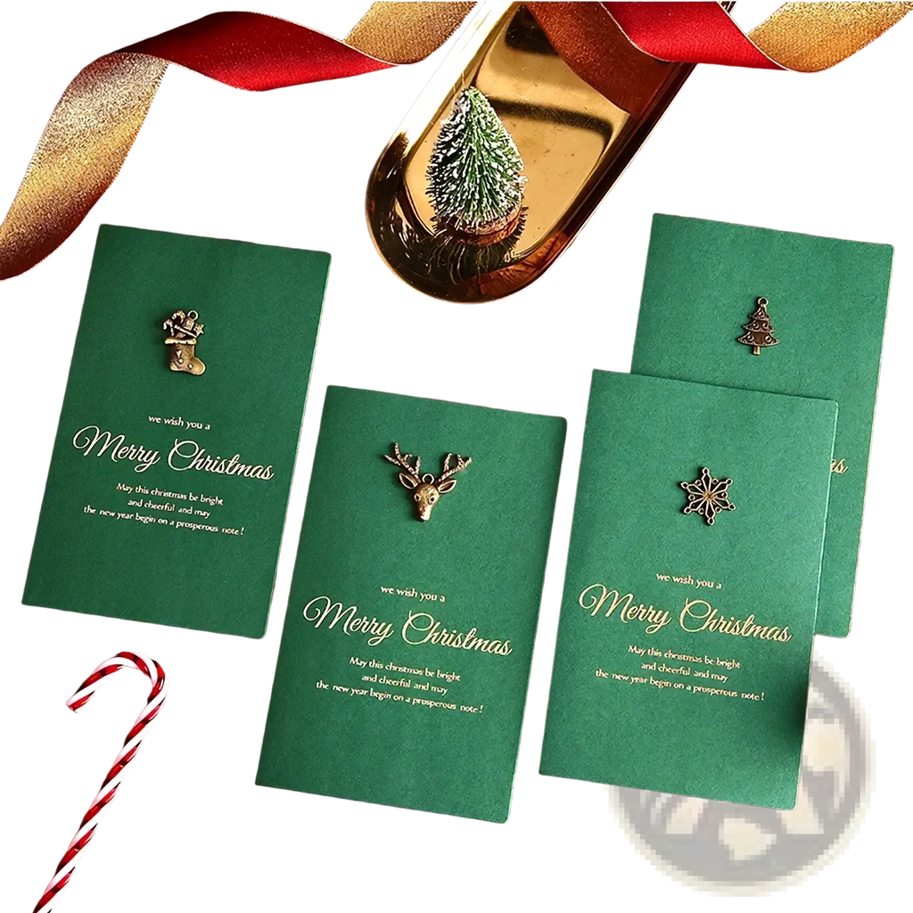 Set of three festive Christmas greeting cards with metallic reindeer stocking and snowflake charms on green cardstock