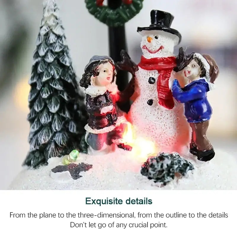 A festive resin snowman figurine with black top hat and red scarf stands beside children in a christmas house light display