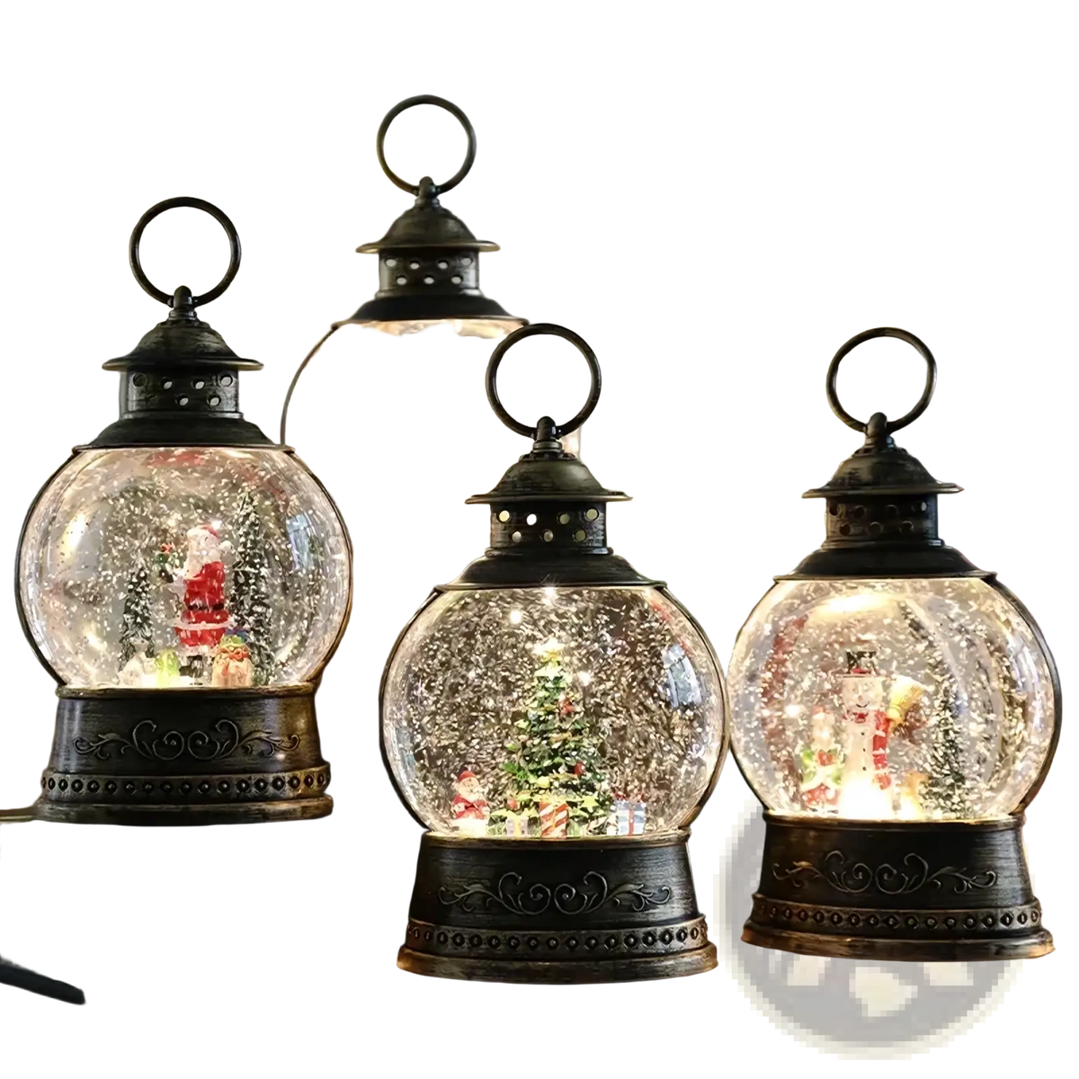 Four ornate dark bronze lantern style snow globe music boxes with illuminated miniature Christmas scenes inside glass spheres