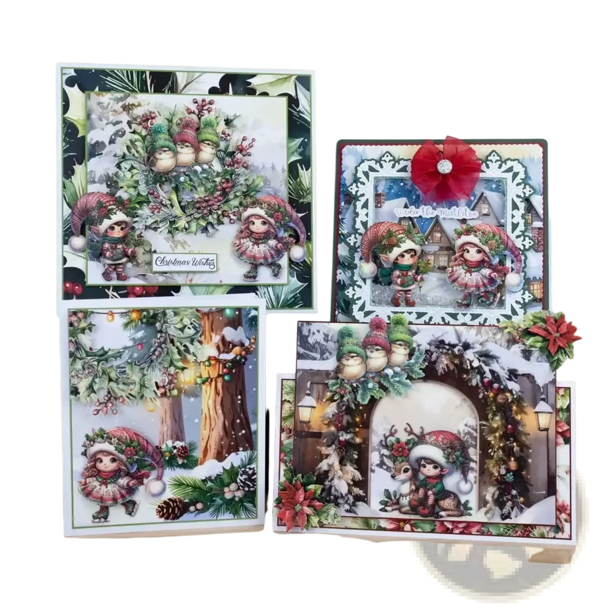 Set of four christmas metal cutting die and stamp cards featuring illustrated elves in winter attire with red and green decorations