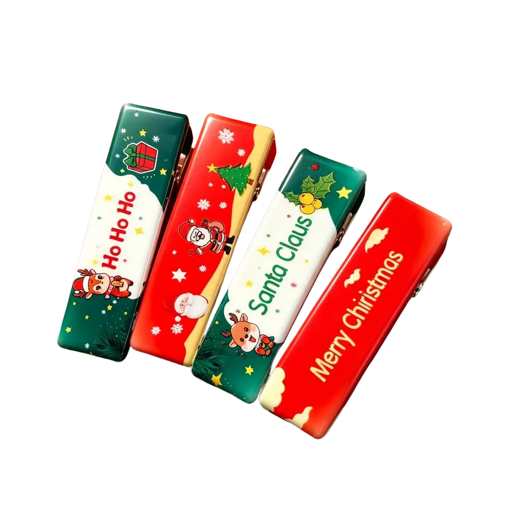 Four festive christmas santa squishy slow rising stress relief toys with colorful holiday designs on glossy plastic surfaces