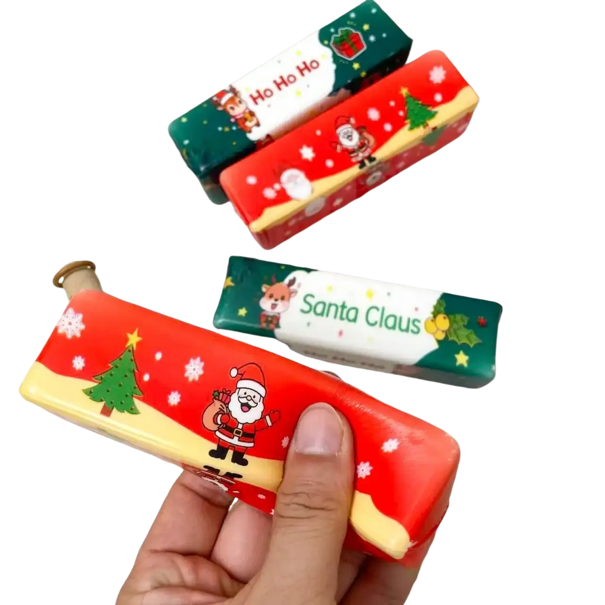Christmas santa squishy slow rising stress relief toy in red and green with santa claus design and festive snowflakes