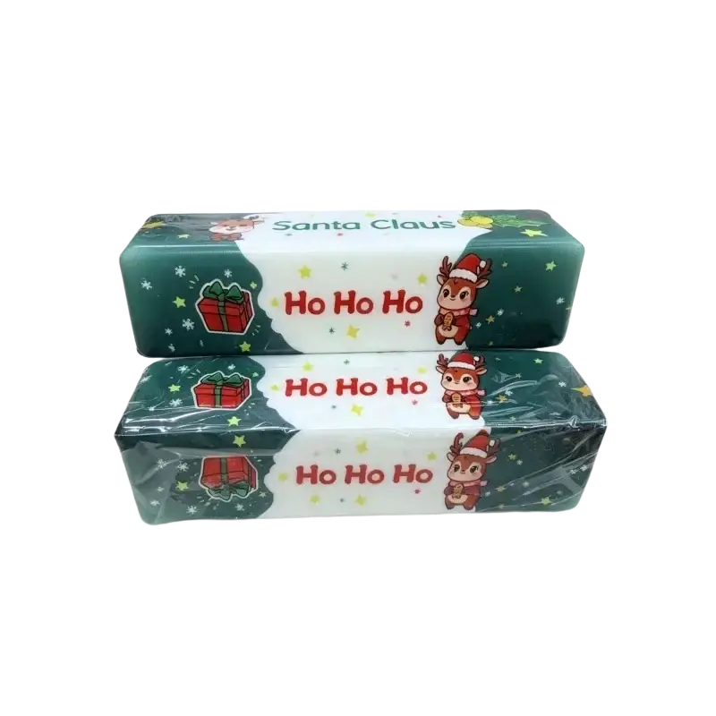 Christmas santa squishy slow rising stress relief toy in green and white packaging with cartoon reindeer and ho ho ho text
