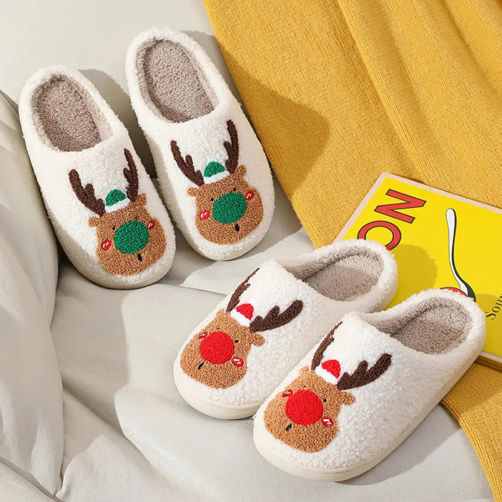 White plush reindeer plush christmas slippers with cozy faux fur embroidered faces brown antlers red and green noses