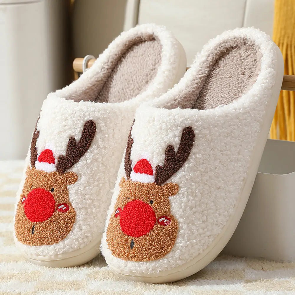 White fluffy reindeer plush christmas slippers with embroidered faces brown antlers red noses and cozy faux fur lining