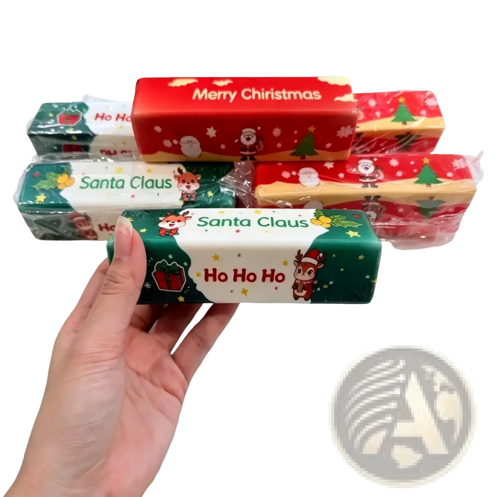A festive green and white slow rebound butter bar squishy toy with reindeer santa claus and ho ho ho text