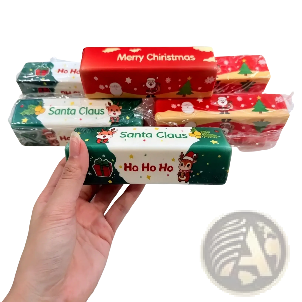 A festive green and white slow rebound butter bar squishy toy with reindeer santa claus and ho ho ho text