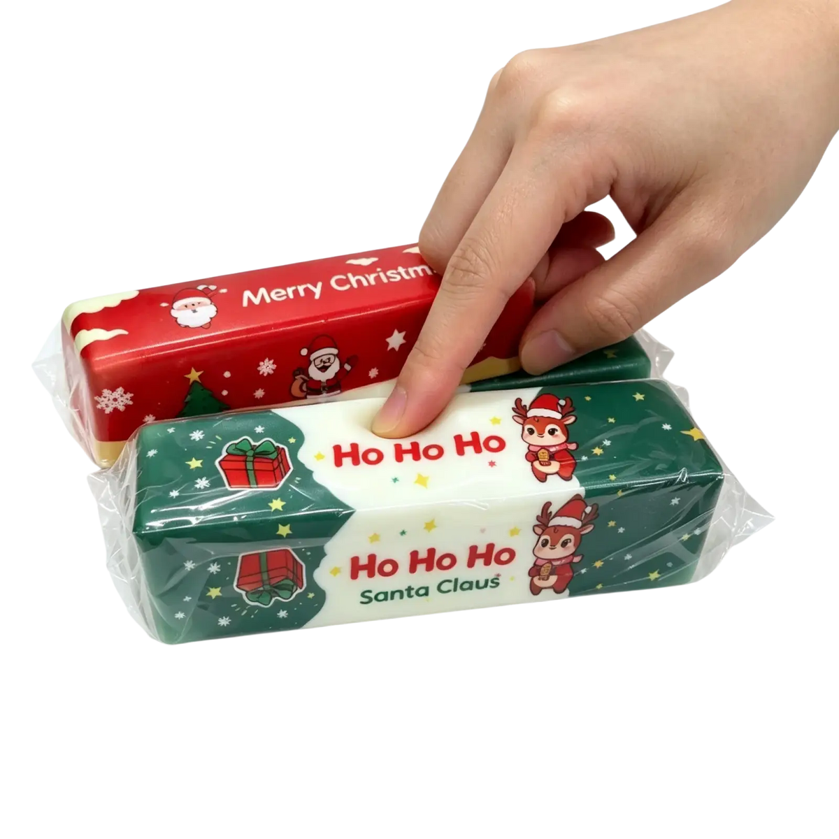 Red and green christmas slow rebound butter bar squishy toy erasers with festive cartoon designs wrapped in clear plastic