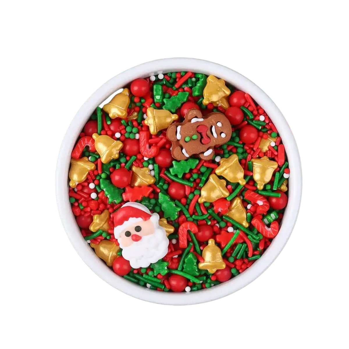 A white bowl filled with red green and gold festive holiday baking decorations including bells candy canes and gingerbread men