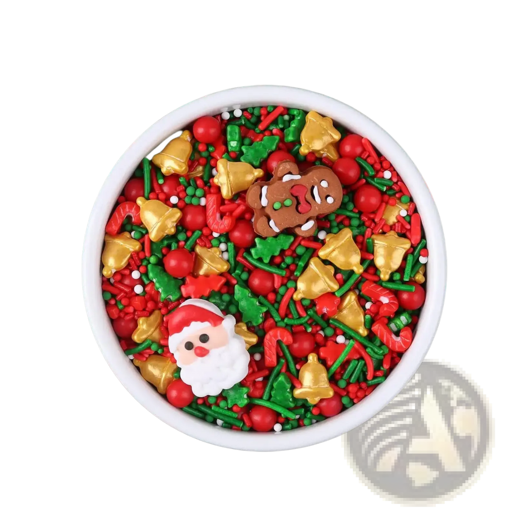 A festive bowl of christmas sprinkles mix with red green and gold santa gingerbread and bell shapes for holiday baking