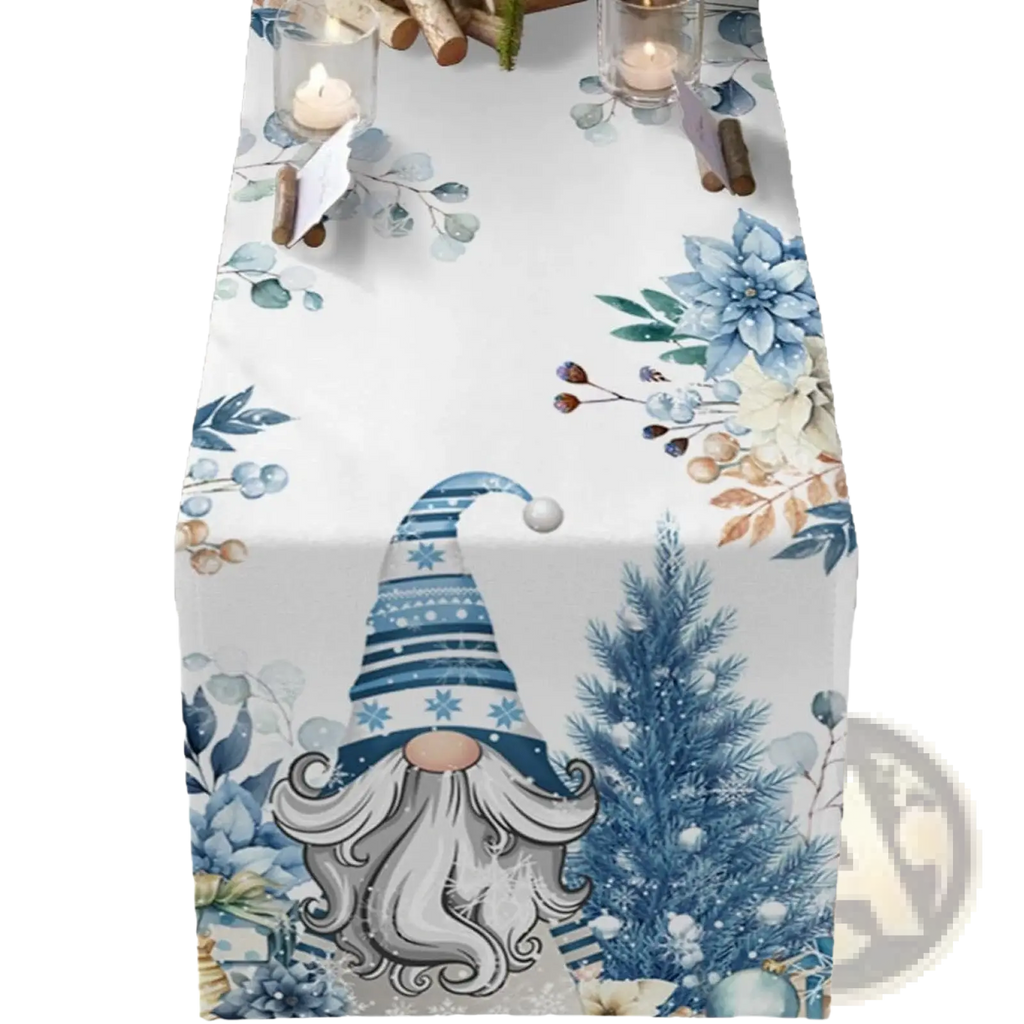 Blue and white watercolor-style gnome with striped hat and long beard on festive foliage christmas table runner 183x33