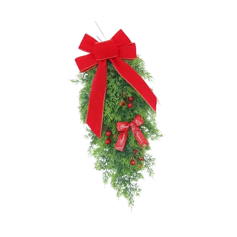 A festive green artificial christmas wreath with red velvet bows and berries package includes one piece for holiday porch decoration