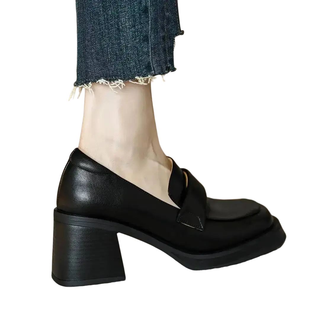 Black leather loafers with chunky block heel and classic slip-on design for stylish and comfortable wear