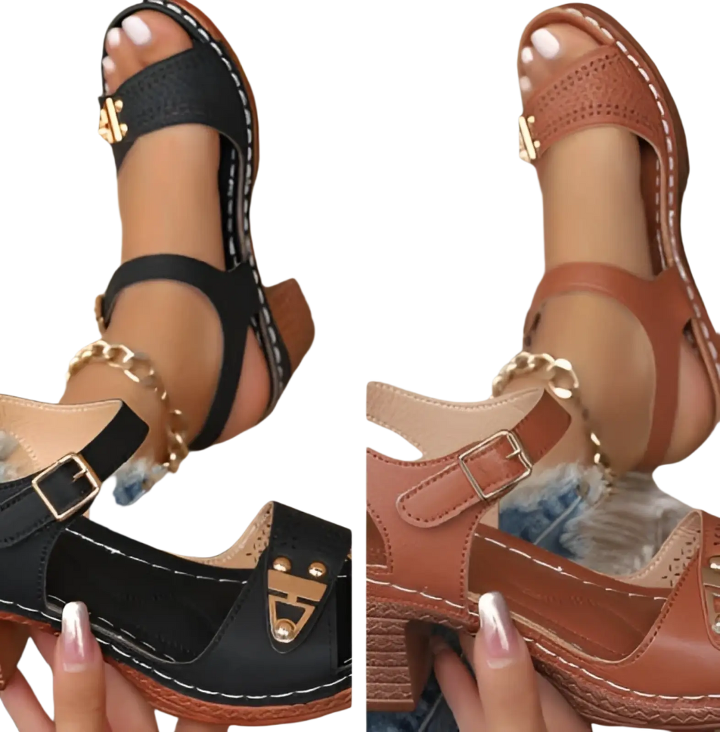 Black and tan chunky heel sandals with buckle, gold-tone metal accents, stitched detailing, chain anklet, and pigskin lining