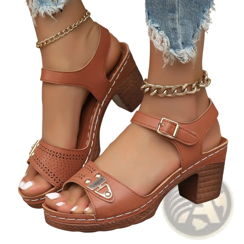 Tan leather chunky heel sandals with decorative metal buckle cutout detailing and pigskin lining for comfort
