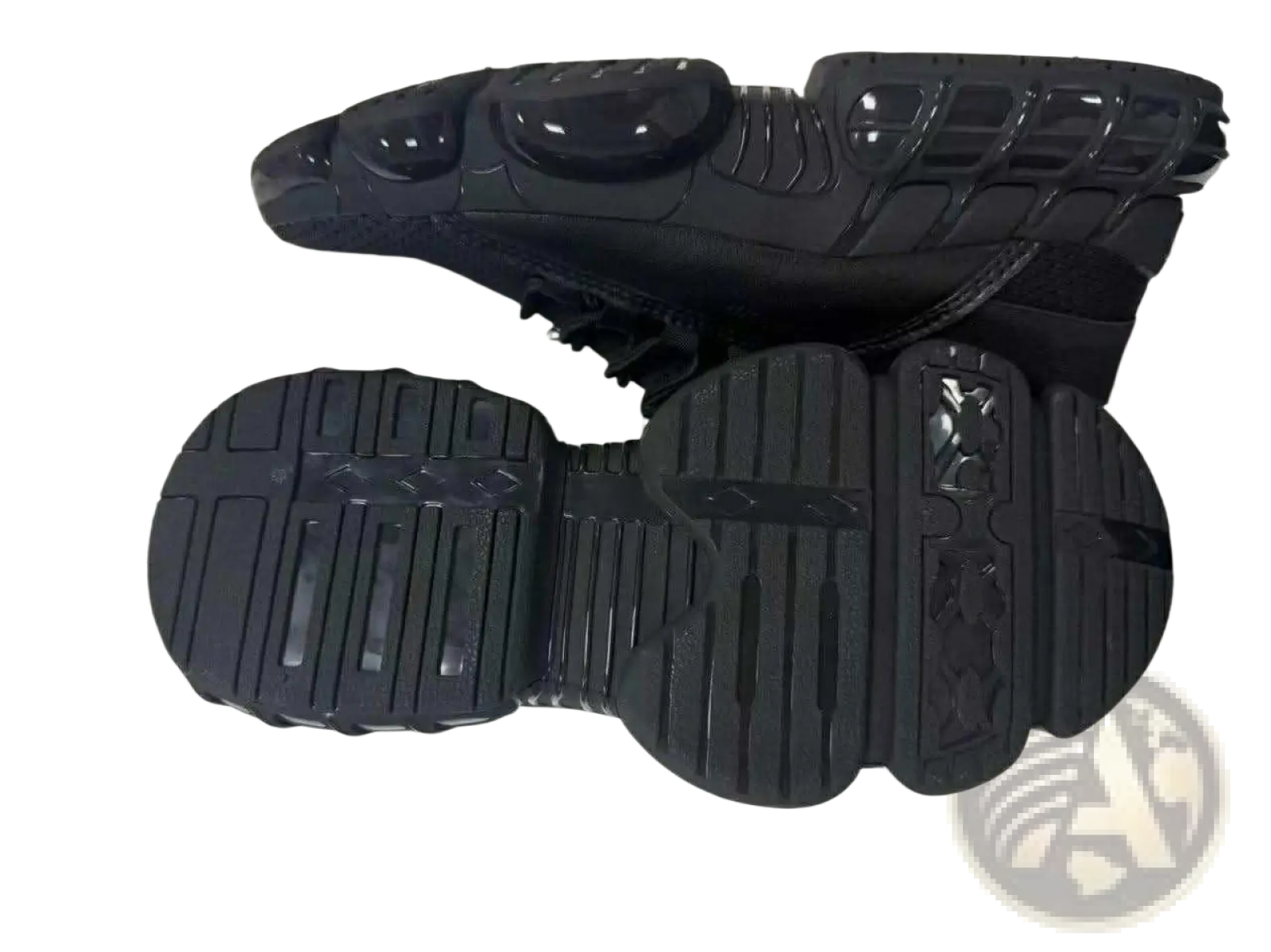 Black chunky mesh running sneakers with glossy sculpted upper and textured rubber sole for lightweight breathability