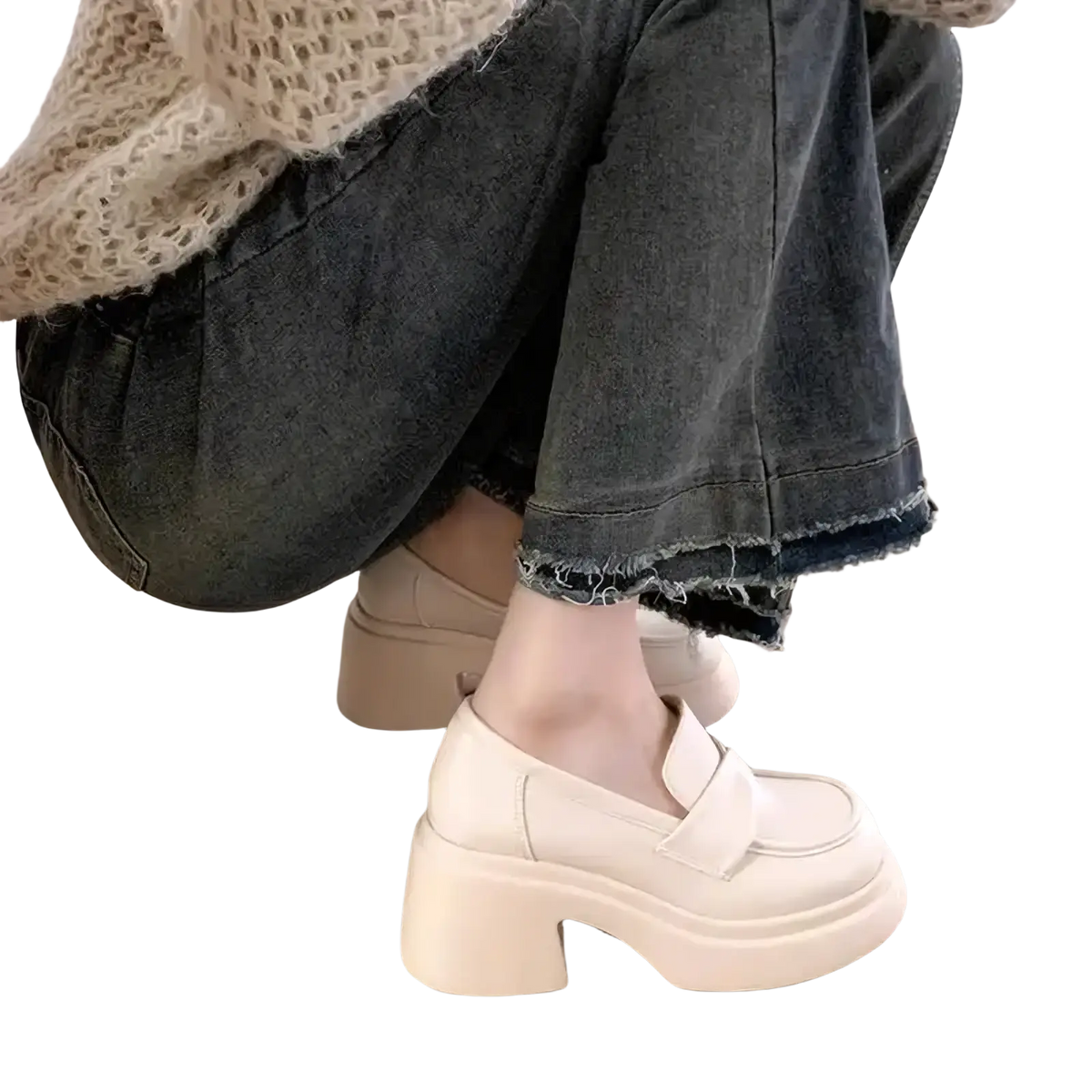 Cream-colored chunky platform Mary Jane loafer with thick block heel and soft leather upper for stylish wear