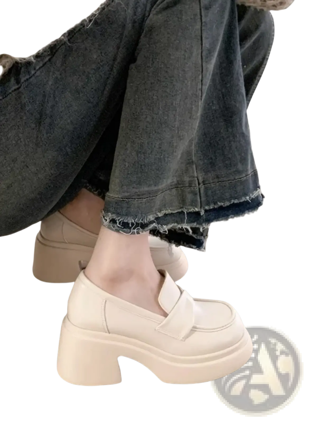 Cream-colored chunky platform mary jane loafers with thick block heel and soft leather upper for stylish comfort