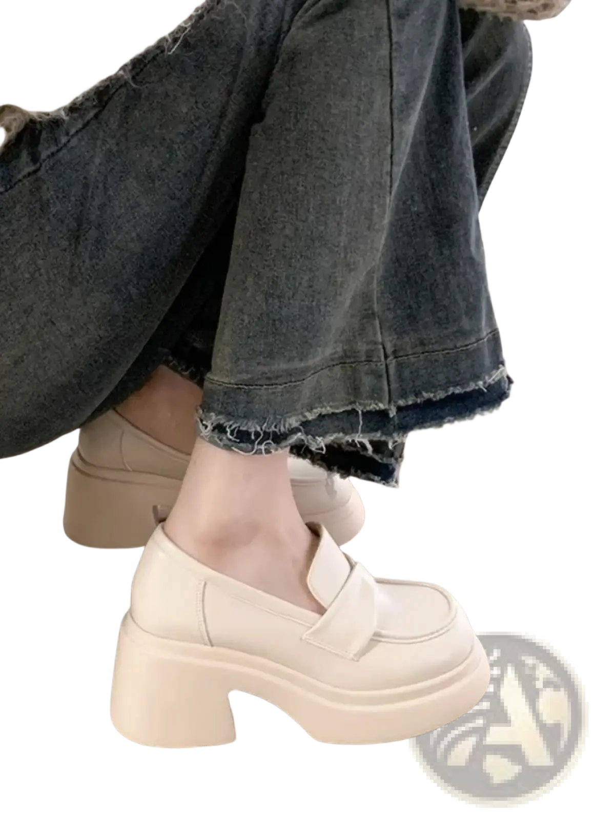Cream-colored chunky platform mary jane loafers with thick block heel and soft leather upper for stylish comfort