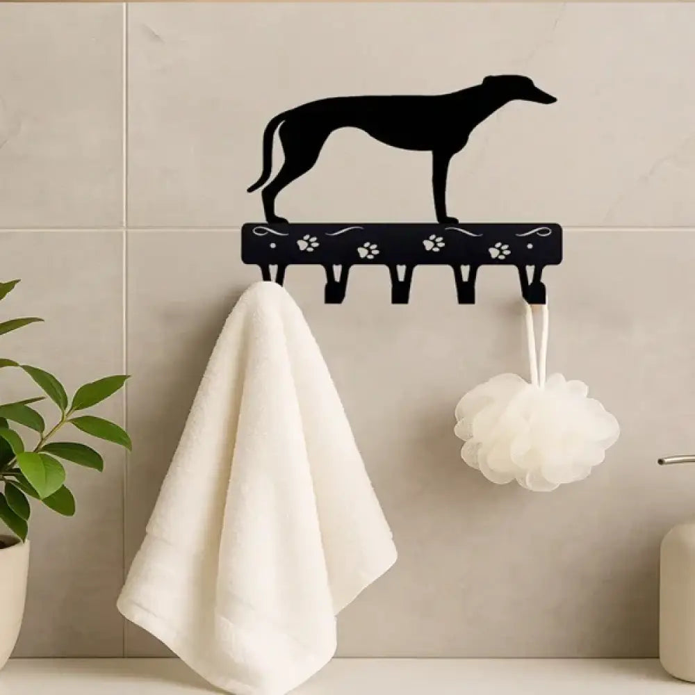 Black metal wall-mounted towel rack shaped like a greyhound with paw print accents for hanging items