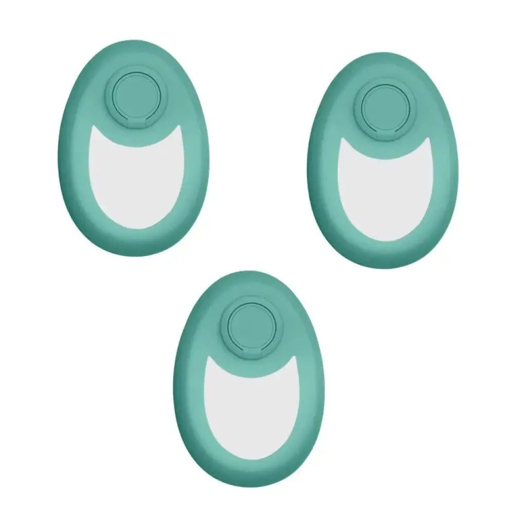 Three teal silicone nano glass crystal hair erasers with white inner section and circular button for painless removal