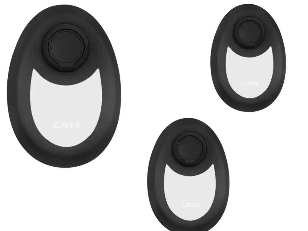 Black and white cueer wireless charging pads with sleek oval design and central button alongside teal nano glass crystal hair eraser
