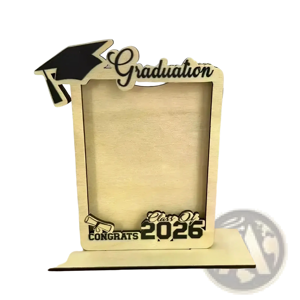 Light-colored wooden graduation photo frame with laser-cut black cap, graduation script, and class of 2026 congrats engraving