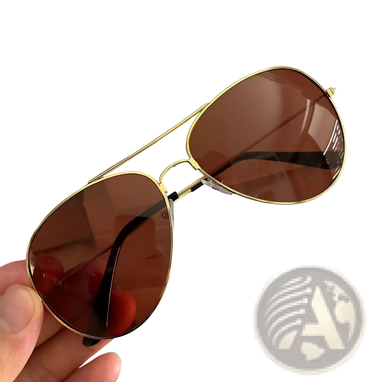 Classic gold rimmed aviator sunglasses with brown gradient lenses and black temple arms for UV protection